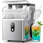 A stainless steel countertop ice machine with a clear hopper filled with ice, shown on a white background with a scoop of ice and a glass of colorful iced drink.
